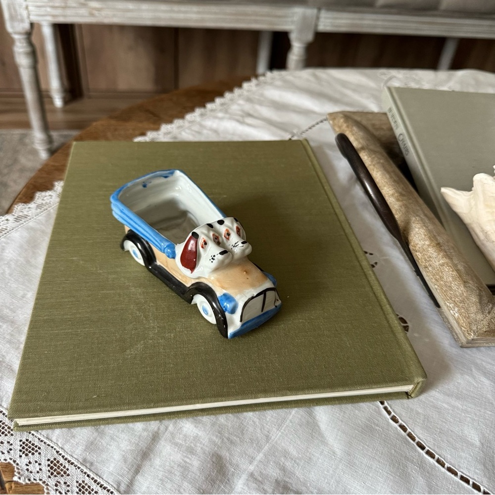 antique basset hounds dogs driving a car plant pot